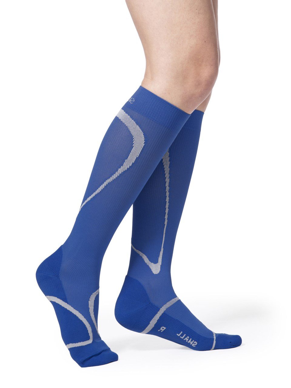 Female wearing MOTION HIGH TECH compression socks in BLUE