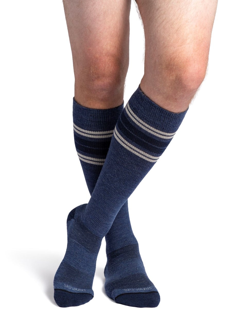 Man wearing Motion Thermoregulating Wool compression socks in the color Denim Multi-Stripe