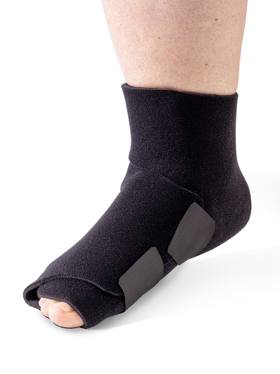Woman wearing Sigvaris MCE Compreflex Reduce Foot compression garment in black