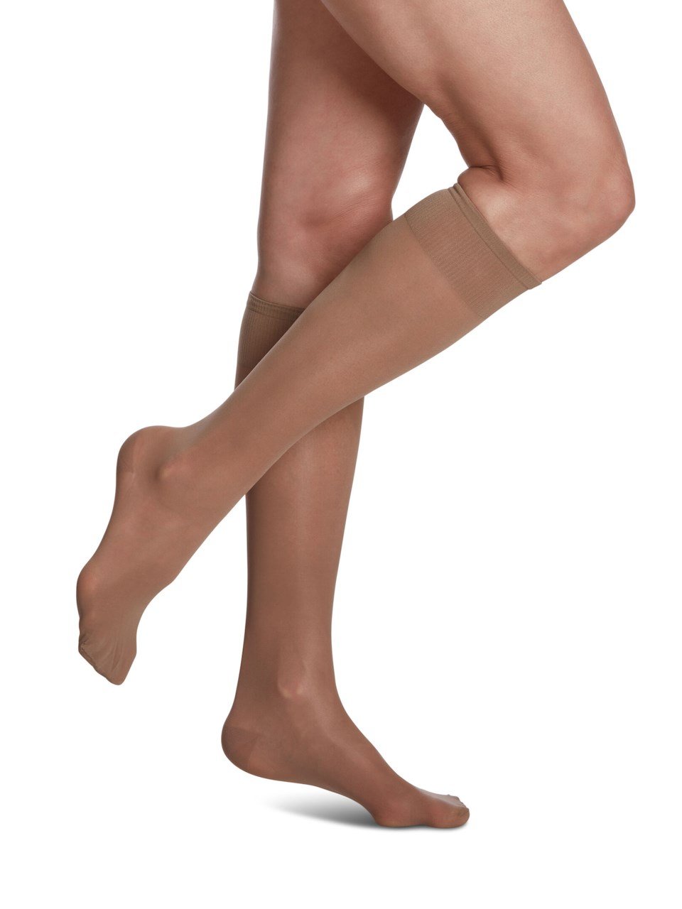 Female wearing WELLBEING SHEER FASHION compression calf stockings in TAUPE